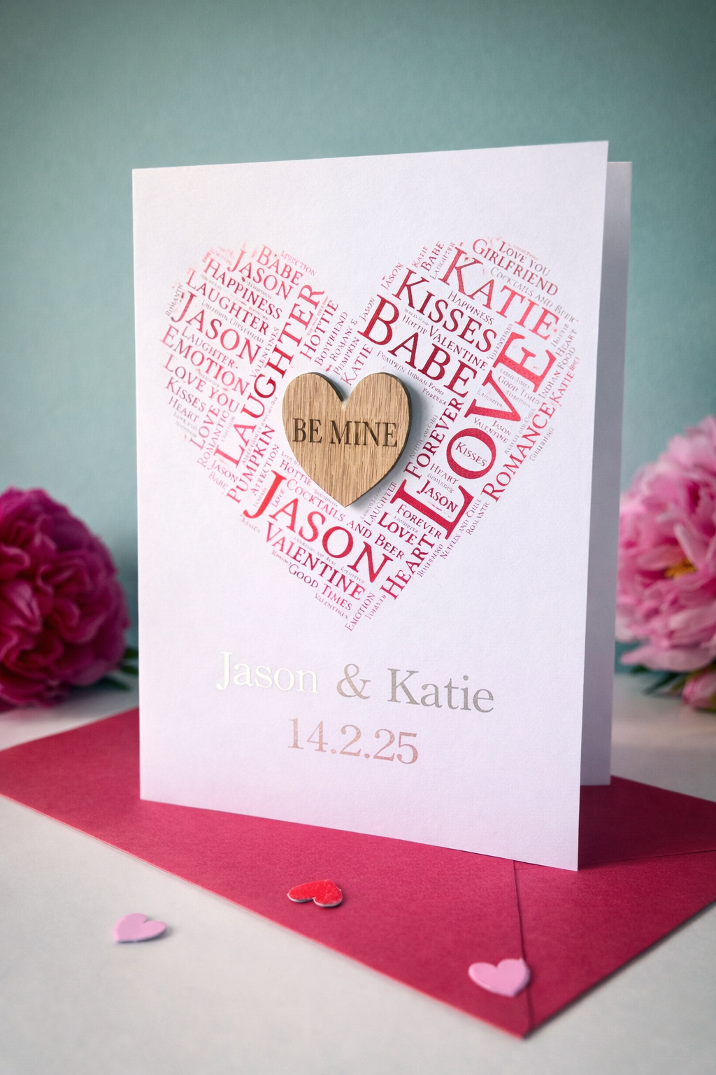 Personalised Valentine’s or anniversary card featuring heart shaped word art and engraved wooden heart centre, customised with names and special date